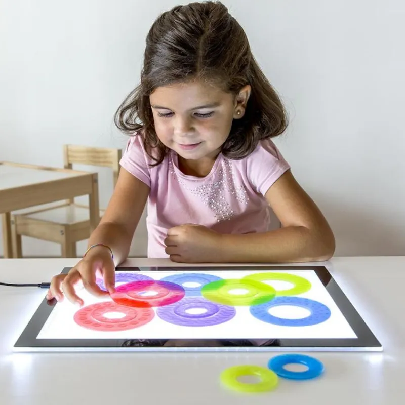 Miniland Anillos translúcidas colores y tamaños surtidos 16pzas para mesa de luz