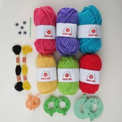 Button Bag Maletín crea con pompones